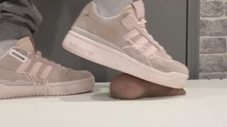 trampling in pink sneakers