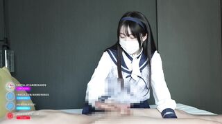 Japanese girls in a classical sailor suit gives a guy a handjob and thighjob